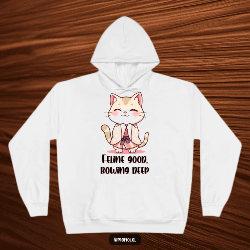 Funny cheerful cat in a patterned kimono energetically bowing, cozy hoodie art.
