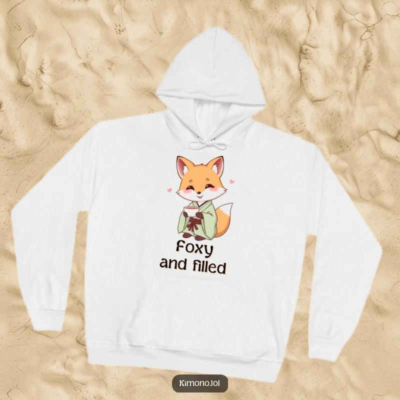 Funny smiling fox in a silk kimono offering a small teacup, cozy hoodie art.
