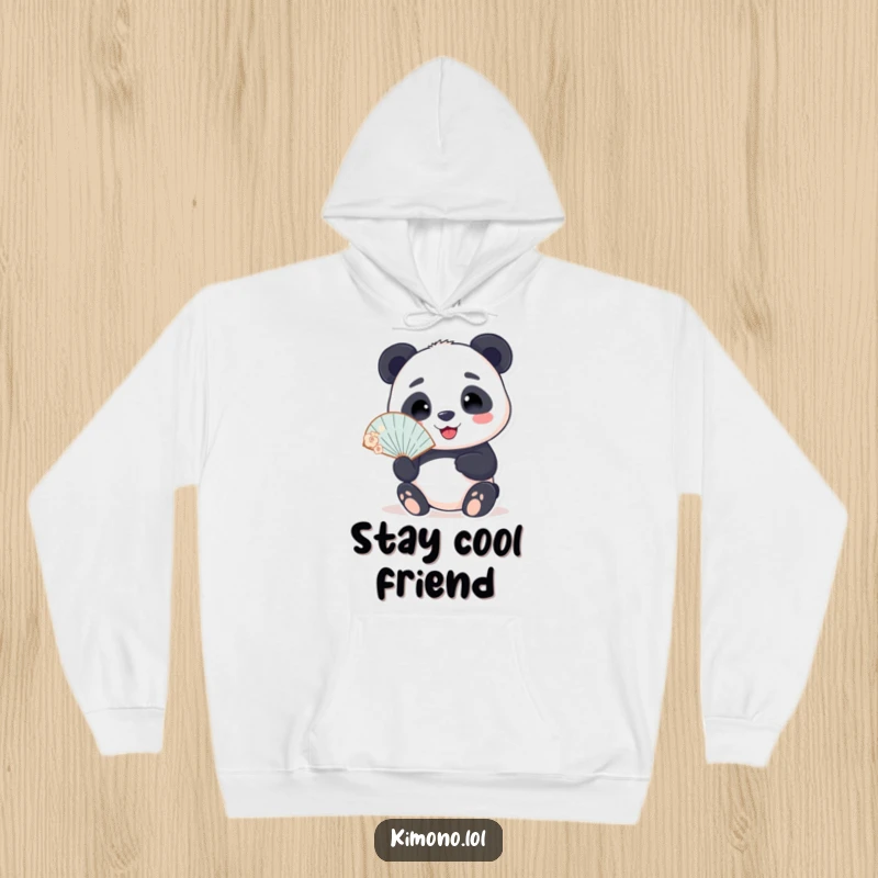 Funny hoodie featuring a smiling panda character holding a delicate fan, blending cozy comfort with peaceful and humorous charm.
